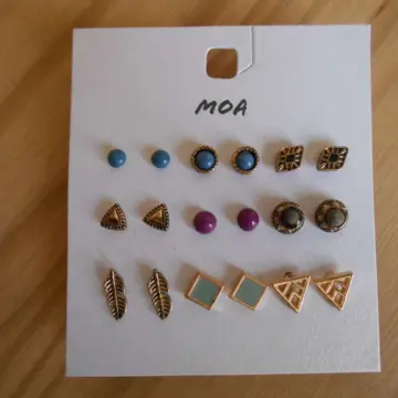 Boucles d'oreilles neuves, Moa