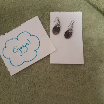 Boucle d'oreilles, Inconnue