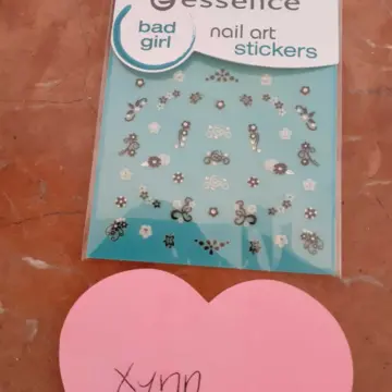 Planche de stickers nail art, Essence