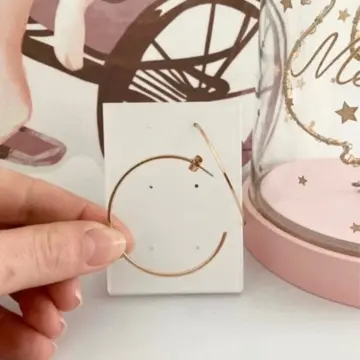 Boucles d’oreilles dorée, H&M