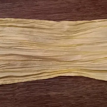 Bandeau plissé à cheveux., Inconnue