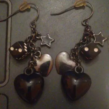 Boucles d'oreilles, Inconnue
