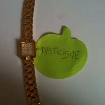 montre couleur or, Inconnue