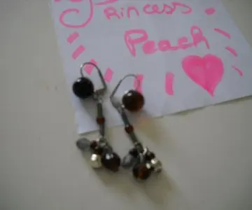 Boucles d'oreilles, Inconnue