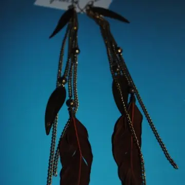 Boucles d'oreilles plumes, Réserve Naturelle