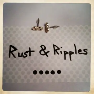 Clous d'oreilles motif "infini", Rings & Tings