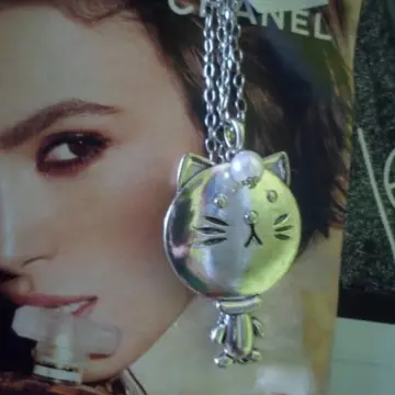 Collier chat, Cache cache