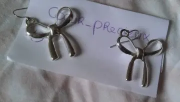 boucle d oreille, Inconnue