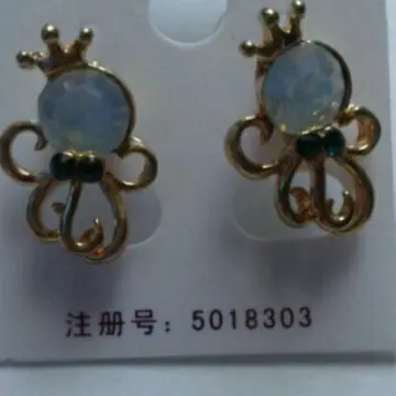 boucle d'oreille pieuvre, Inconnue