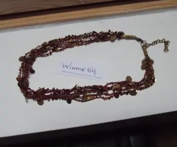 collier marron, Inconnue