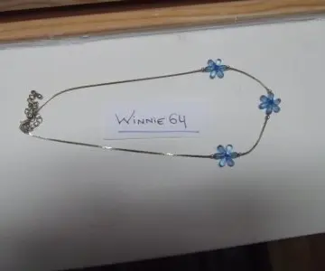 collier fleur bleue, Inconnue