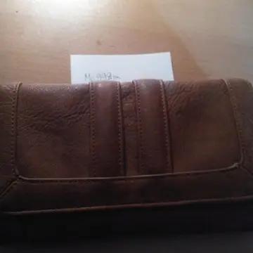 Portefeuille marron, Inconnue