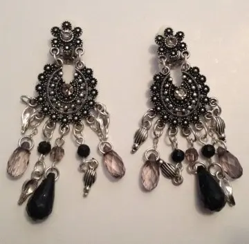 Boucles d'oreilles, Inconnue