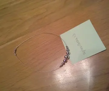 collier gris, Pimkie