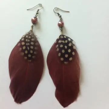 boucle d'oreilles, Inconnue