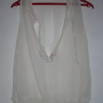 Débardeur blanc transparent, Inconnue