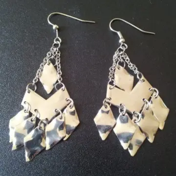 boucles d'oreilles, Inconnue