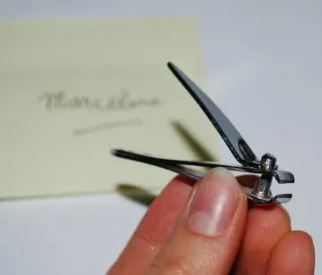 Petit coupe ongles, NSP