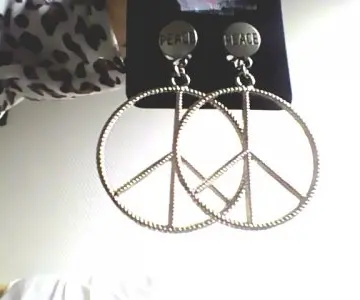Boucles d'oreille, Inconnue