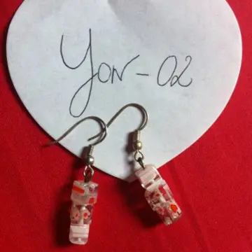 boucles d'oreilles, Inconnue