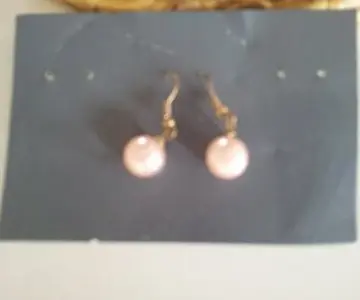 boucles oreille, Inconnue