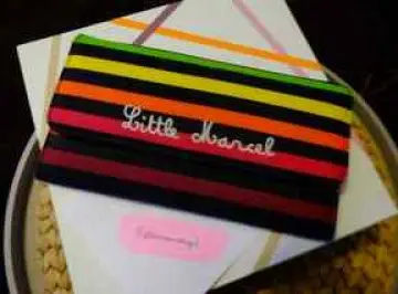 Portefeuille Little Marcel, Little Marcel