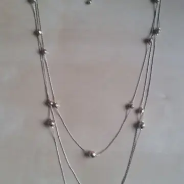Collier 3 niveaux doré, Inconnue