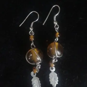 boucles d'oreilles, Inconnue