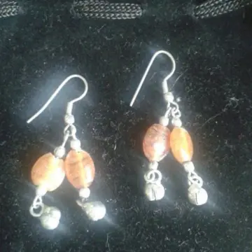 boucles d'oreilles, Inconnue
