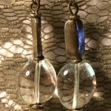 Boucle d'oreille argent, Inconnue
