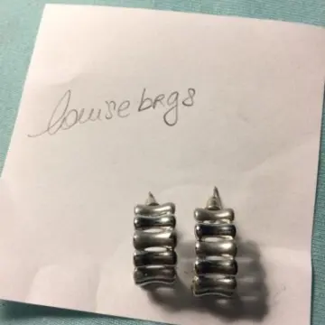 Boucle d'oreille argent, Inconnue