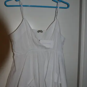 Top blanc, In extenso