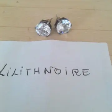 Boucles d'oreille, Inconnue