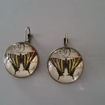 boucles d'oreilles, Inconnue
