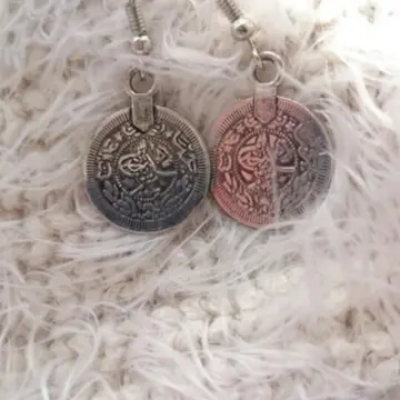 boucle d'oreille ethnique, Inconnue