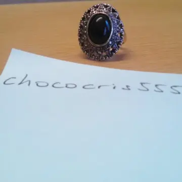 Bague pierre noire, Inconnue