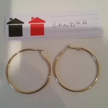 boucle d'oreilles, Inconnue
