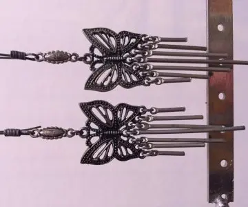 Boucle d'oreille, Inconnue