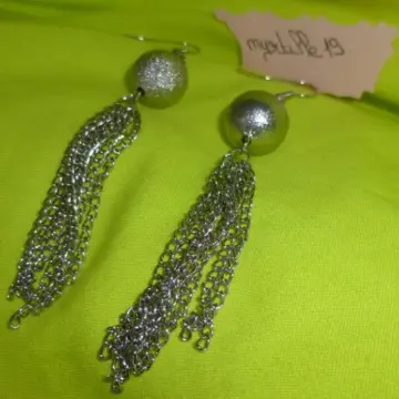 boucles d'oreilles, Inconnue