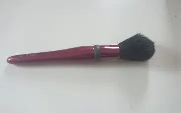 Pinceau blush, Revlon