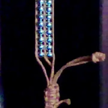 Bracelet ficelle, Inconnue