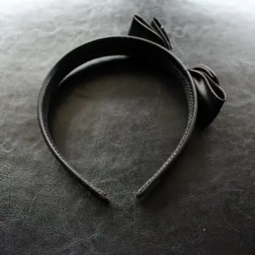 Serre tête noeud noir, Inconnue