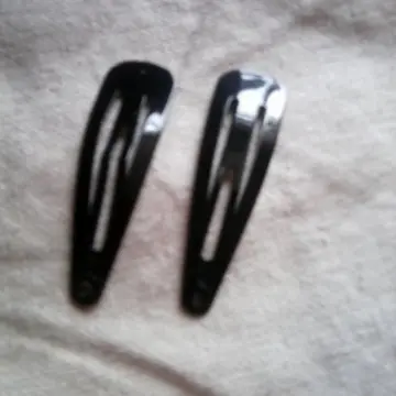 Petites barrettes noires, H&M