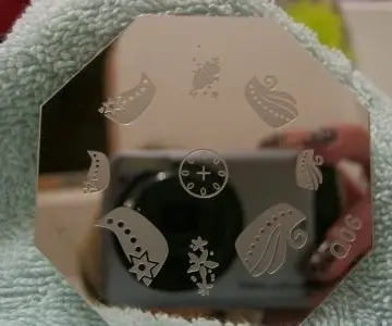 plaque stamping Q06, Inconnue