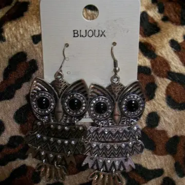 boucle d'oreille hiboux, Inconnue