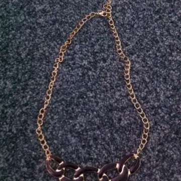 collier doré/noir, Inconnue