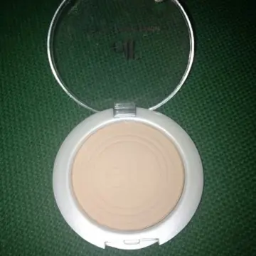 poudre compacte, Elf