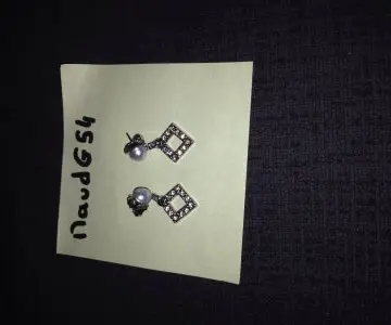 Boucle d'oreille, Inconnue
