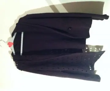 Veste en maille violet., Inconnue
