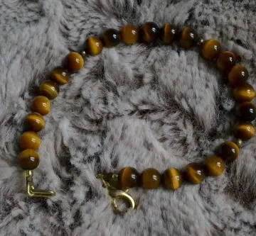 Bracelet Perles Oeil du Tigre, Inconnue